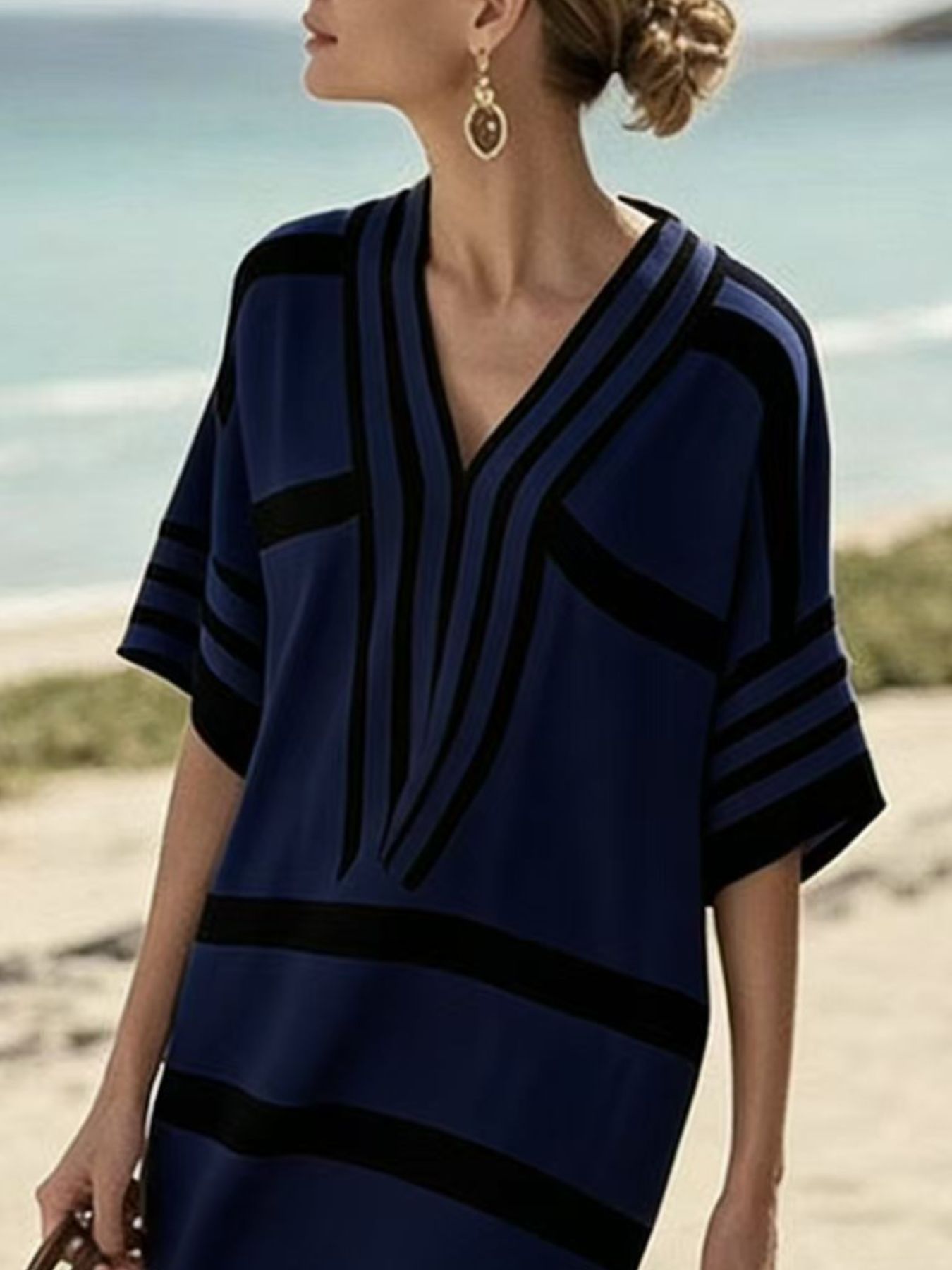 Plus size full size striped half sleeve midi dress on mannequin