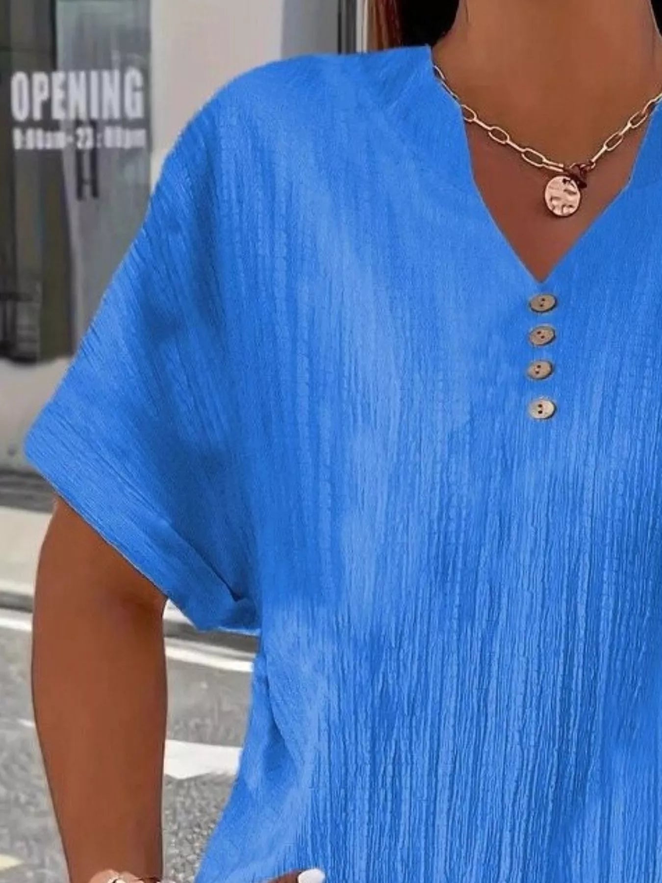 Plus size notched short sleeve textured top with decorative button in 3XL size