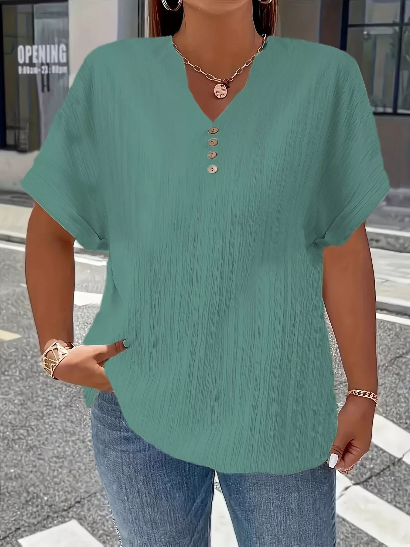 Plus size notched short sleeve textured top with decorative button in various sizes