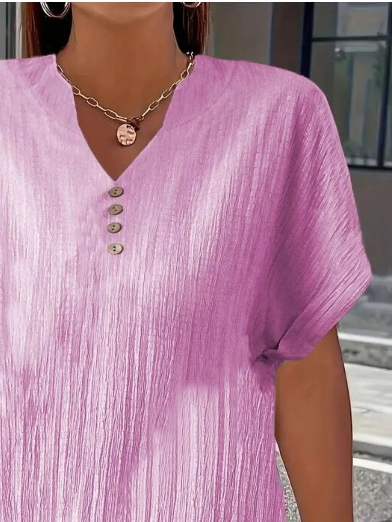 Plus size notched short sleeve textured top with decorative button in black polyester