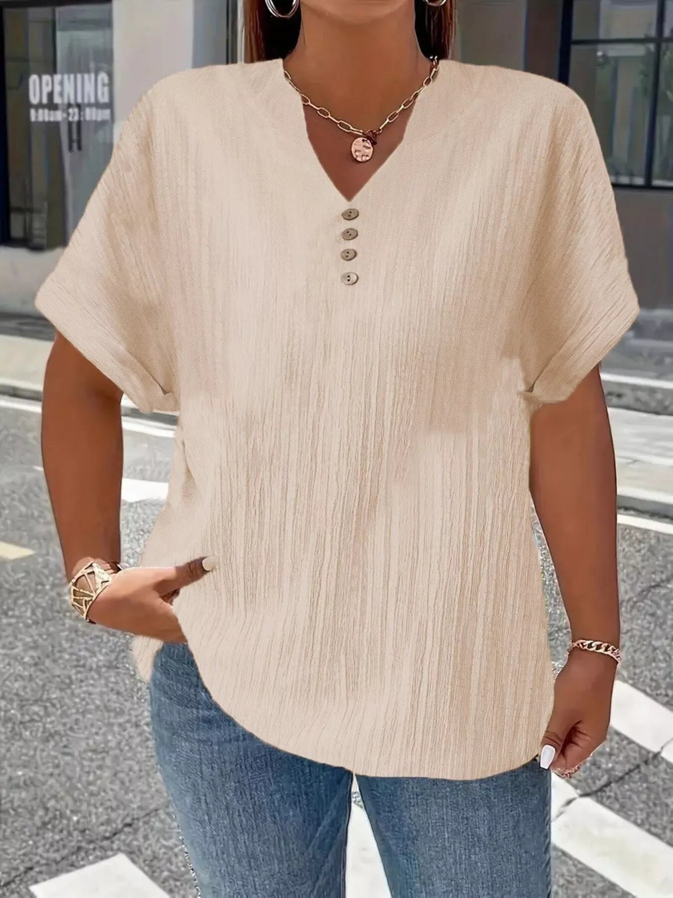 Plus size notched short sleeve textured top with decorative button in various sizes