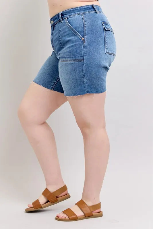 Plus size Judy Blue full size mid-rise bermudas denim shorts with back flap pockets and raw hem